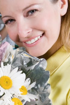 Woman holding a bouquet of flowers