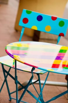Close_up of a table with a folding chair, Cannes, Provence_Alpes_Cote dŽAzur, France