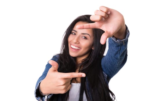 Young woman making framing key gesture - isolated over white