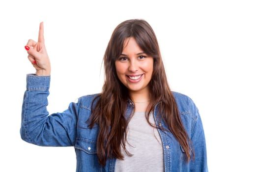 Young beautiful woman presses key, isolated over white