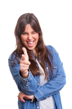 Young beautiful woman pointing at you, isolated over white