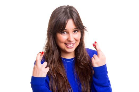 Woman with crossed fingers, isolated over a white background
