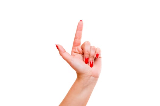 Cropped view of a hand indicating the number one with its fingers