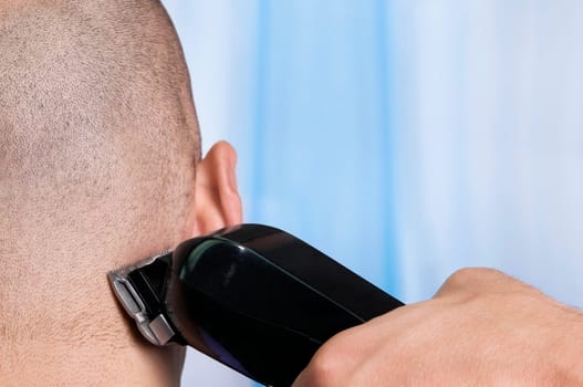 Man receiving a haircut in a salon
