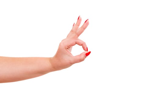 Cropped view of a female signaling ok