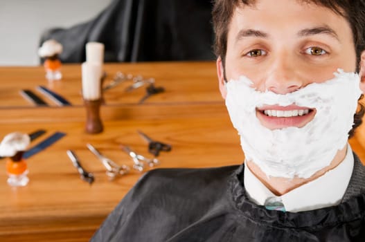 Man getting shaved in a salon