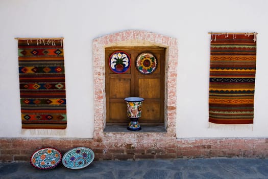 Decorative craft products on a wall, Santa Fe, New Mexico, USA