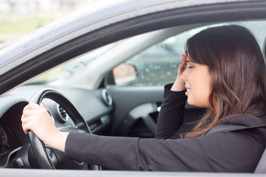 Woman in panic after having a car crash