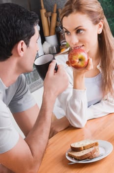 Mid adult couple having breakfast