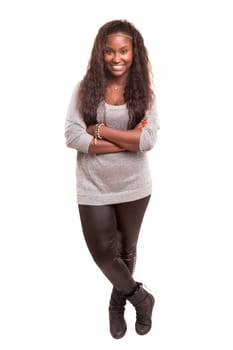 Beautiful young african woman posing isolated over white