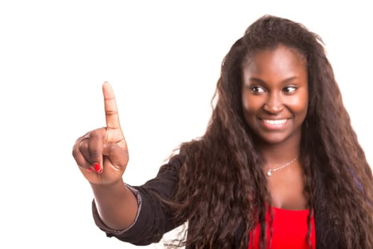 Young beautiful woman presses key, isolated over white