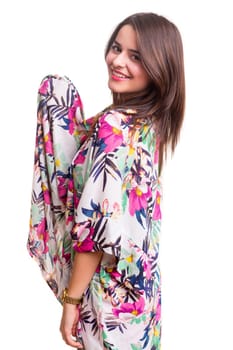 Young woman dressed for summer, isolated over white