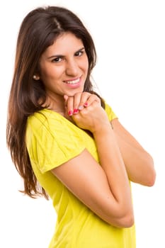 Beautiful young casual woman posing isolated over white
