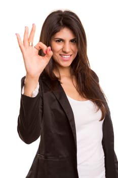 Business woman signaling ok - isolated over white