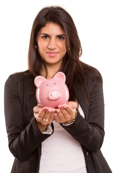 Young woman holding a piggy bank (money box) - savings concept
