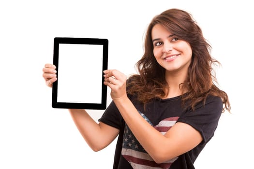 Happy young woman presenting your product in a tablet computer