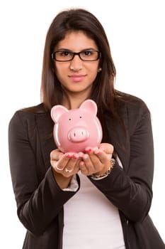 Young woman holding a piggy bank (money box) - savings concept