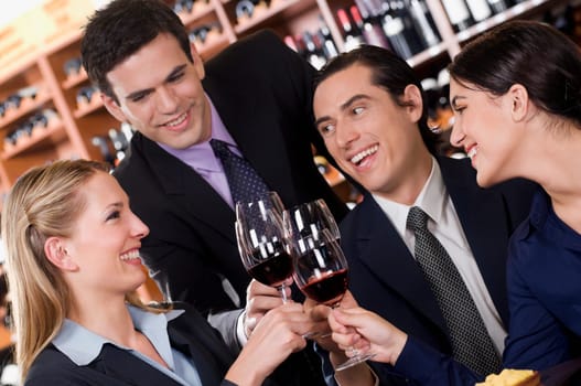 Business executives toasting with wine