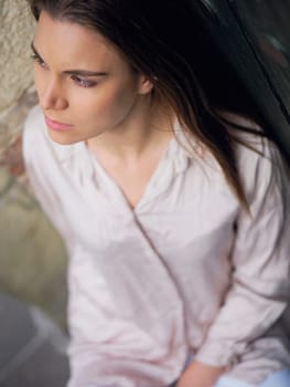 High angle view of a mid adult woman looking serious