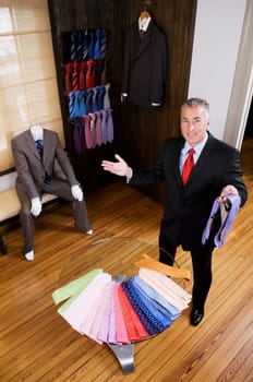 Portrait of a businessman in a clothing store