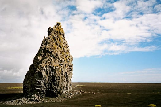 Rock formations at the coast, Black Sand Beach, Iceland