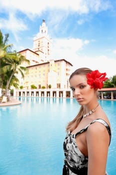 Portrait of a woman standing at the poolside, Biltmore Hotel, Coral Gables, Florida, USA