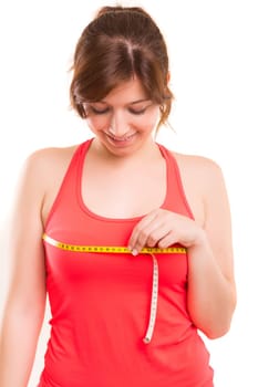 Woman measuring her body - fitness concept