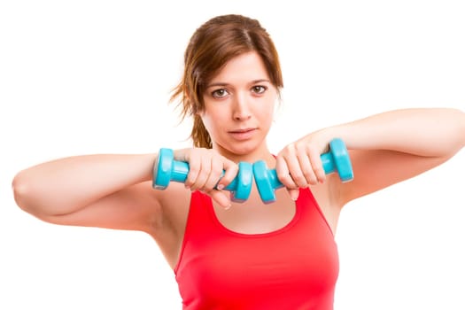 A beautiful young woman in great shape - fitness concept