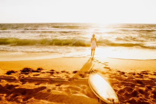 Rear view of a woman standing on the beach