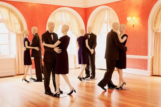 Dummies of couples dancing