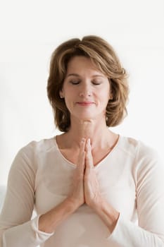 Woman in a prayer position