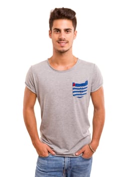Studio picture of a young and handsome man posing isolated