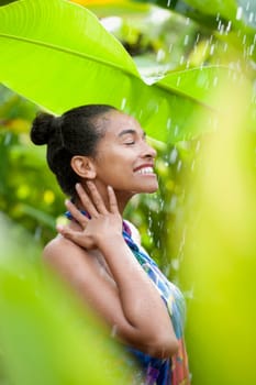 Teenage girl enjoying rain
