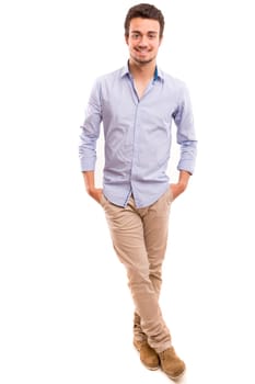 Studio picture of a young and handsome man posing isolated
