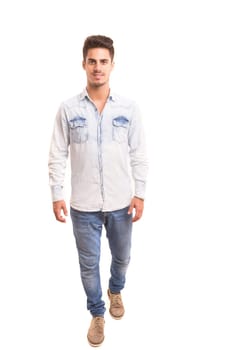 Studio picture of a young and handsome man posing isolated