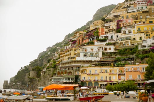 Low angle view of a town on a hill, Spiaggia Grande, Positano, Amalfi Coast, Salerno, Campania, Italy