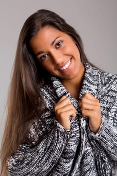 A beautiful young woman posing isolated