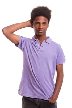 A casual young black boy posing isolated