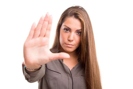 Business woman making stop sign - isolated over white