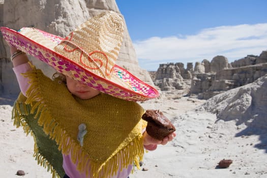 Baby girl wearing a sunhat