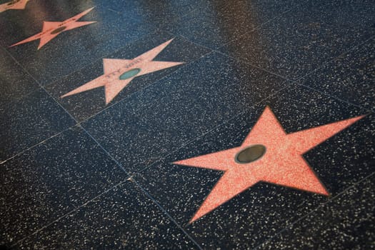 High angle view of celebrities name on stars at the sidewalk, Hollywood Walk of Fame, Hollywood Boulevard, Hollywood, Los Angeles, California, USA