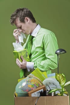 Fired businessman wiping his tears