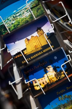 Postcard stand at a market stall, Santa Barbara, California, USA