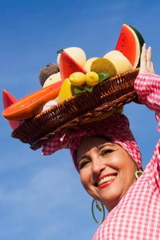 Portrait of a mature woman selling fruits