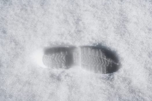 High angle view of a footprint in snow