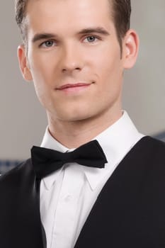 Portrait of a waiter smiling