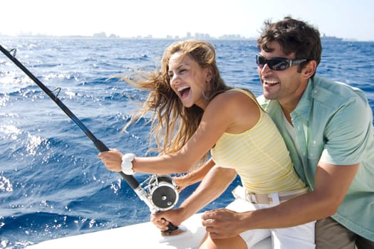 Couple sitting in a boat and fishing