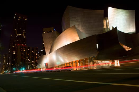 Buildings lit up at night in a city, Walt Disney Concert Hall, Los Angeles, California, USA