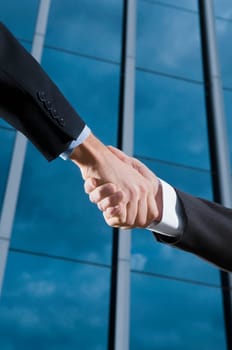 Two businessmen shaking hands