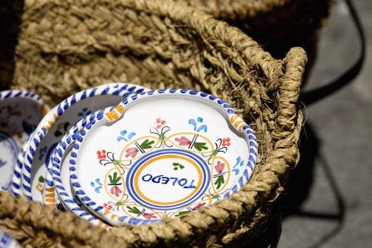 Close_up of plates in a basket